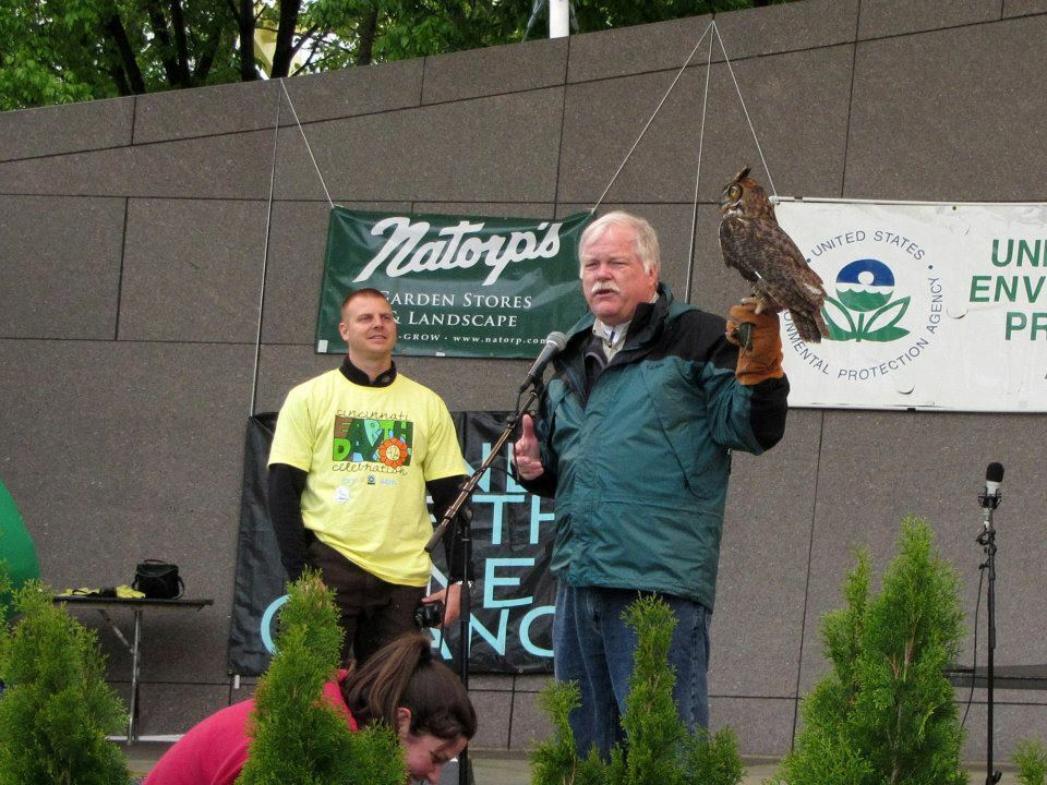 Men on stage showing bird